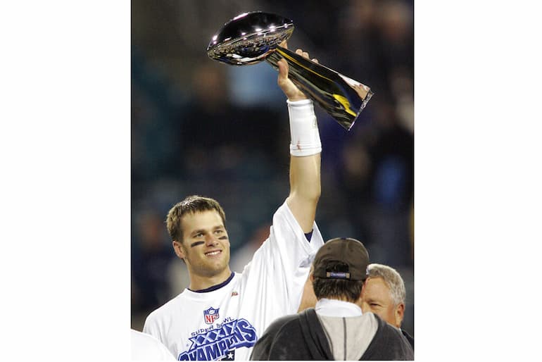 Brady con uno dei trofei vinti!
