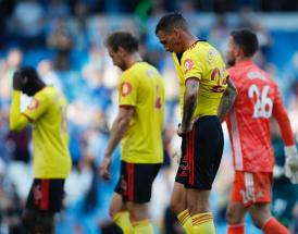 I giocatori del Watford escono dal campo del City