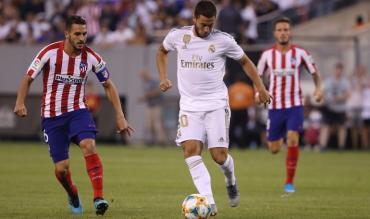 Koke controlla Hazard nel derby "amichevole" negli USA...