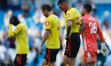 I giocatori del Watford escono dal campo del City